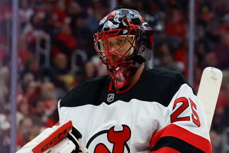 Oct 24, 2024; Detroit, Michigan, USA;  New Jersey Devils goaltender Jacob Markstrom (25) looks on in the second period against the Detroit Red Wings at Little Caesars Arena. Mandatory Credit: Rick Osentoski-Imagn Images