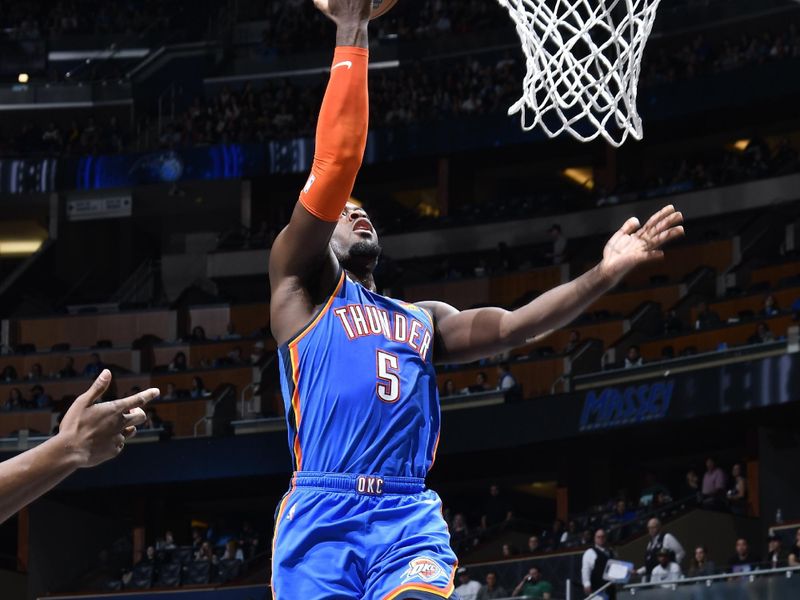 ORLANDO, FL - JANUARY 4:  Luguentz Dort #5 of the Oklahoma City Thunder goes to the basket against the Orlando Magic on January 4, 2023 at Amway Center in Orlando, Florida. NOTE TO USER: User expressly acknowledges and agrees that, by downloading and or using this photograph, User is consenting to the terms and conditions of the Getty Images License Agreement. Mandatory Copyright Notice: Copyright 2023 NBAE (Photo by Gary Bassing/NBAE via Getty Images)