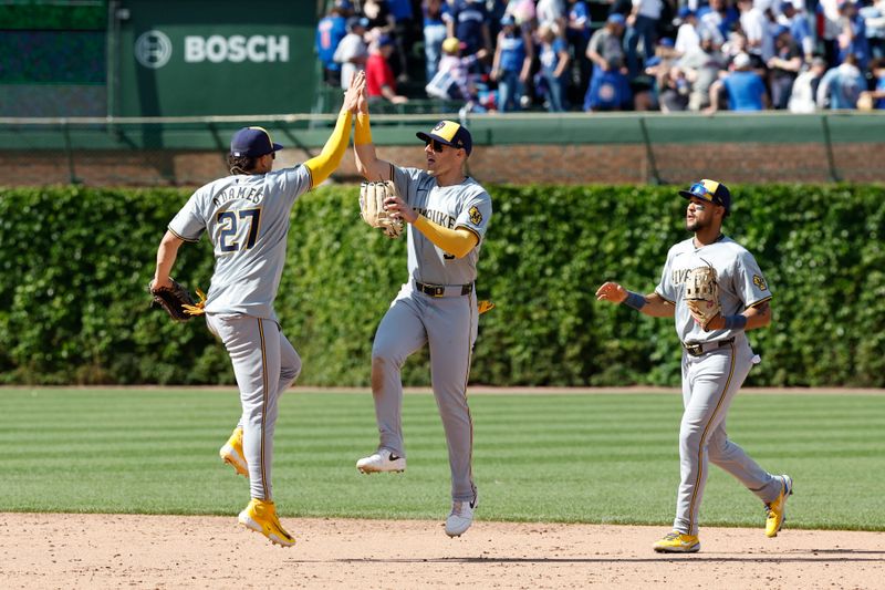 May 3, 2024; Chicago, Illinois, USA; Milwaukee Brewers players celebrate after defeating the Chicago Cubs at Wrigley Field. Mandatory Credit: Kamil Krzaczynski-USA TODAY Sports