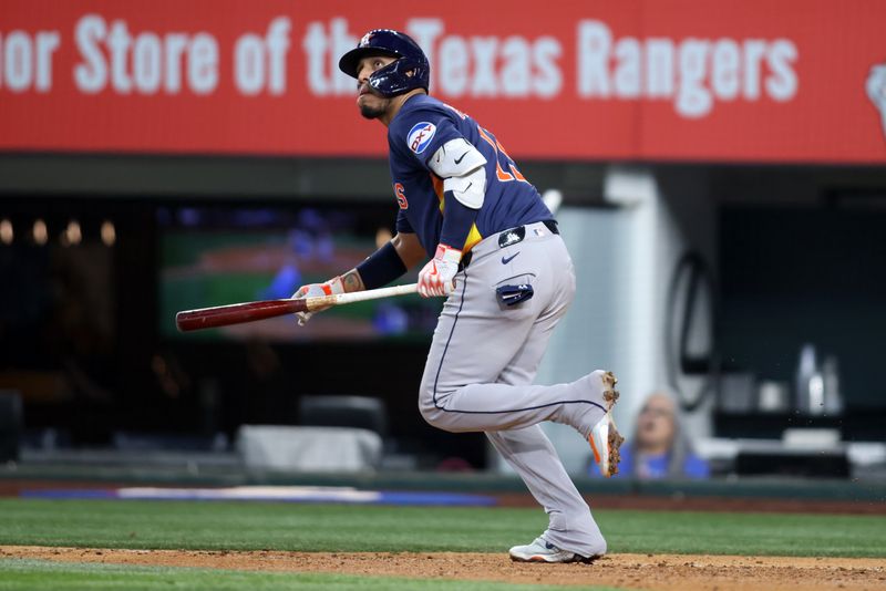 May 18, 2025; Arlington, Texas, USA; Houston Astros third base Isaac Paredes (15) hits a three run home run during the eighth inning against the Texas Rangers at Globe Life Field. Mandatory Credit: Tim Heitman-Imagn Images
