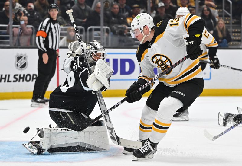 Jan 5, 2023; Los Angeles, California, USA;  Los Angeles Kings goaltender Pheonix Copley (29) deflects a shot on goal by Boston Bruins center Charlie Coyle (13) in the third period at Crypto.com Arena. Mandatory Credit: Jayne Kamin-Oncea-USA TODAY Sports