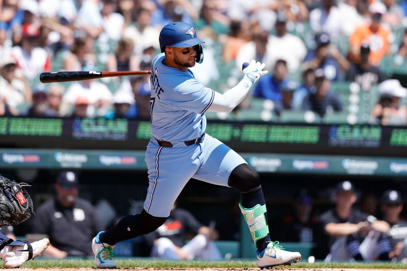 Jul 27, 2025; Detroit, Michigan, USA;  Toronto Blue Jays shortstop Bo Bichette (11) hits a single in the first inning against the Detroit Tigers at Comerica Park. Mandatory Credit: Rick Osentoski-Imagn Images