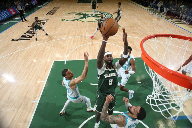 MILWAUKEE, WI - FEBRUARY 9: Bobby Portis #9 of the Milwaukee Bucks drives to the basket during the game against the Charlotte Hornets on February 9, 2024 at the Fiserv Forum Center in Milwaukee, Wisconsin. NOTE TO USER: User expressly acknowledges and agrees that, by downloading and or using this Photograph, user is consenting to the terms and conditions of the Getty Images License Agreement. Mandatory Copyright Notice: Copyright 2024 NBAE (Photo by Gary Dineen/NBAE via Getty Images).