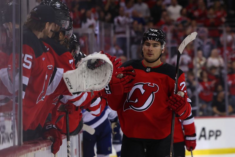 Oct 22, 2024; Newark, New Jersey, USA; New Jersey Devils right wing Timo Meier (28) celebrates his goal against the Tampa Bay Lightning during the third period at Prudential Center. Mandatory Credit: Ed Mulholland-Imagn Images