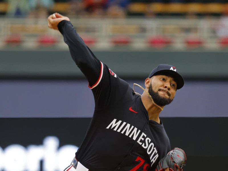 Jun 20, 2024; Minneapolis, Minnesota, USA; Minnesota Twins starting pitcher Simeon Woods Richardson throws to the Tampa Bay Rays in the first inning at Target Field. Mandatory Credit: Bruce Kluckhohn-USA TODAY Sports