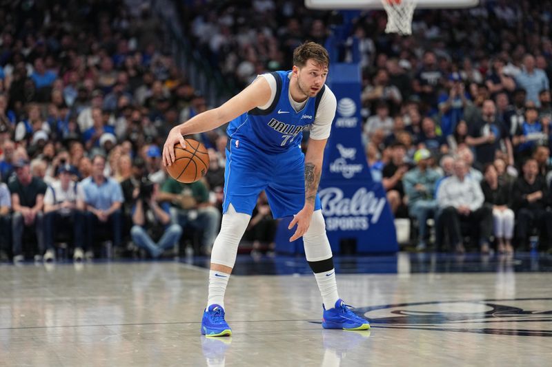 DALLAS, TX - APRIL 4: Luka Doncic #77 of the Dallas Mavericks handles the ball during the game  on April 4, 2024 at the American Airlines Center in Dallas, Texas. NOTE TO USER: User expressly acknowledges and agrees that, by downloading and or using this photograph, User is consenting to the terms and conditions of the Getty Images License Agreement. Mandatory Copyright Notice: Copyright 2024 NBAE (Photo by Glenn James/NBAE via Getty Images)