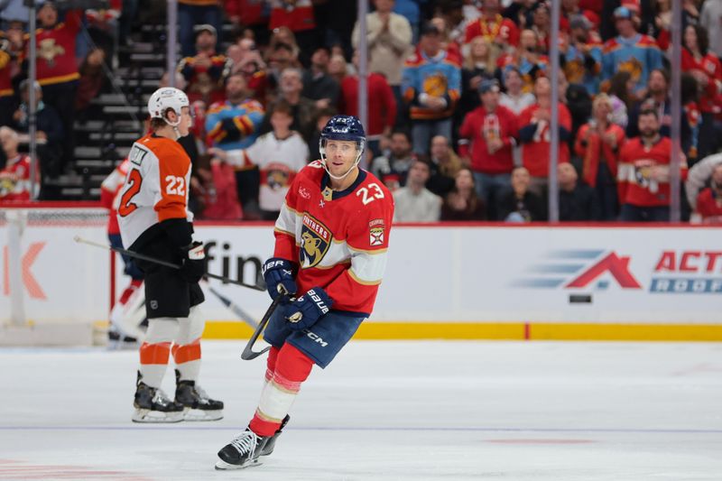 Nov 26, 2025; Sunrise, Florida, USA; Florida Panthers center Carter Verhaeghe (23) looks on after scoring against the Philadelphia Flyers during the second period at Amerant Bank Arena. Mandatory Credit: Sam Navarro-Imagn Images