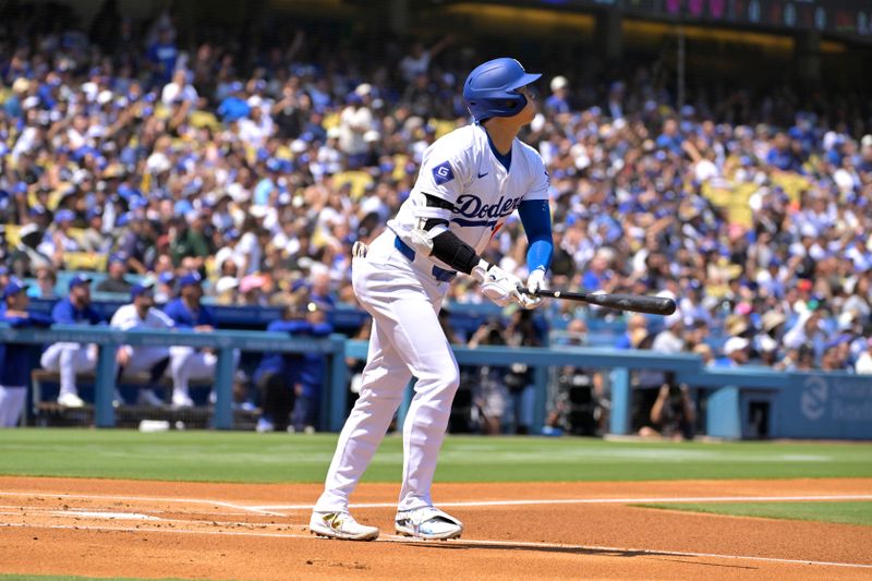 Aug 25, 2024; Los Angeles, California, USA;  Los Angeles Dodgers designated hitter Shohei Ohtani (17) flies out in the first inning against the Tampa Bay Rays at Dodger Stadium. Mandatory Credit: Jayne Kamin-Oncea-USA TODAY Sports