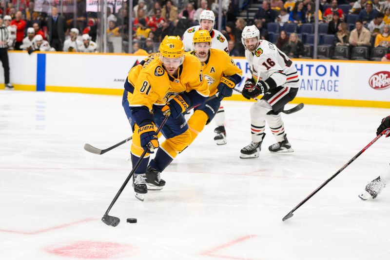 Jan 16, 2025; Nashville, Tennessee, USA;  Nashville Predators center Jonathan Marchessault (81) skates with the puck against the Chicago Blackhawks during the third period at Bridgestone Arena. Mandatory Credit: Steve Roberts-Imagn Images