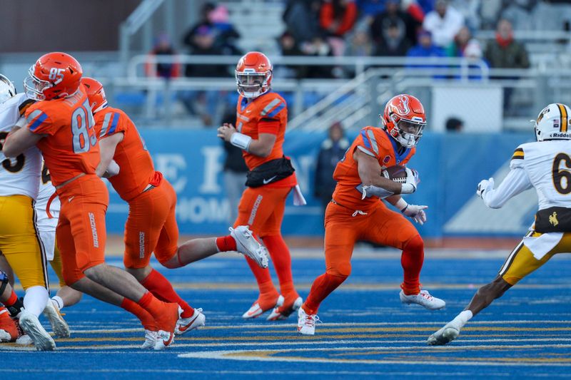 Oct 28, 2023; Boise, Idaho, USA; Boise State Broncos running back George Holani (24) during the second half against the Wyoming Cowboys at Albertsons Stadium. Mandatory Credit: Brian Losness-USA TODAY Sports

