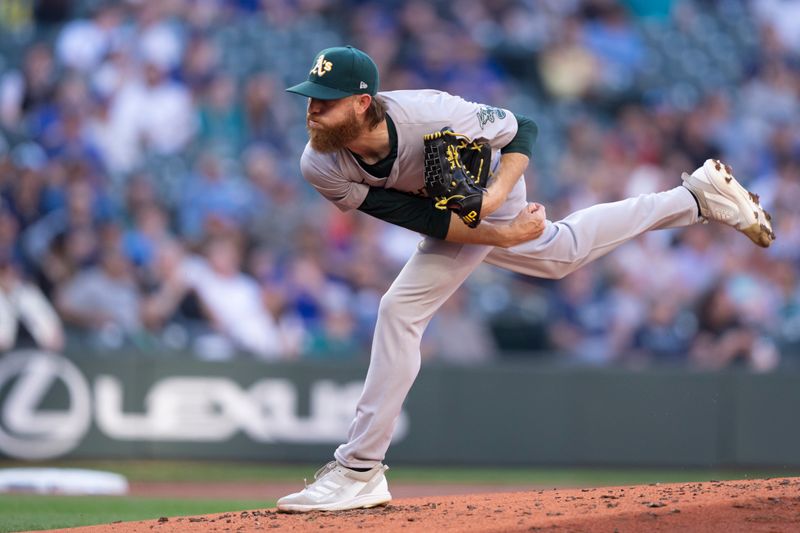 May 8, 2024; Seattle, Washington, USA; Oakland Athletics starter Paul Blackburn (58) delivers a pitch during the second inning against the Seattle Mariners at Lumen Field. Mandatory Credit: Stephen Brashear-USA TODAY Sports