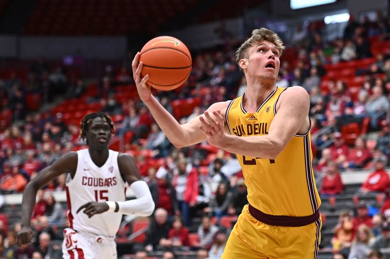 Jan 28, 2023; Pullman, Washington, USA; Arizona State Sun Devils forward Duke Brennan (24) shoots the ball against the Washington State Cougars in the first half at Friel Court at Beasley Coliseum. Mandatory Credit: James Snook-USA TODAY Sports