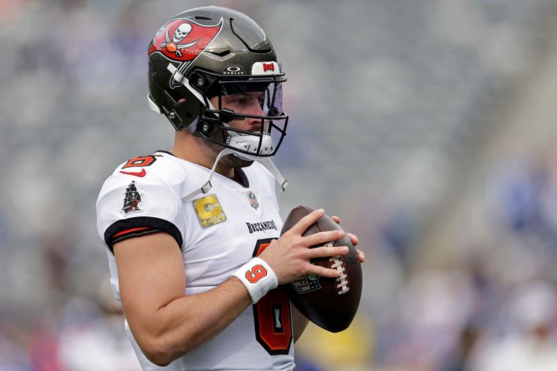 Tampa Bay Buccaneers quarterback Baker Mayfield (6) warms up before an NFL football game against the New York Giants Sunday, Nov. 24, 2024, in East Rutherford, N.J. (AP Photo/Adam Hunger)