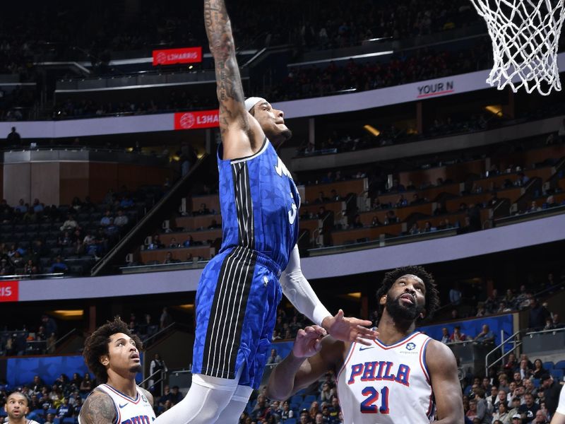 ORLANDO, FL - JANUARY 19: Chuma Okeke #3 of the Orlando Magic dunks the ball during the game against the Philadelphia 76ers on January 19, 2024 at the Kia Center in Orlando, Florida. NOTE TO USER: User expressly acknowledges and agrees that, by downloading and or using this photograph, User is consenting to the terms and conditions of the Getty Images License Agreement. Mandatory Copyright Notice: Copyright 2024 NBAE (Photo by Gary Bassing/NBAE via Getty Images)