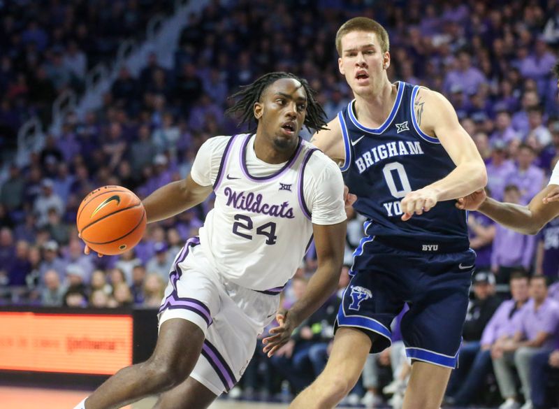 Feb 24, 2024; Manhattan, Kansas, USA; Kansas State Wildcats forward Arthur Maluma (24) drives to the basket against Brigham Young Cougars forward Noah Waterman (0) duering the first half at Bramlage Coliseum. Mandatory Credit: Scott Sewell-USA TODAY Sports