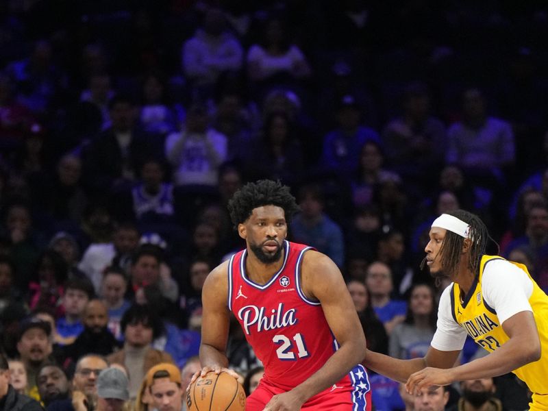 PHILADELPHIA, PA - DECEMBER 13: Joel Embiid #21 of the Philadelphia 76ers dribbles the ball during the game against the Indiana Pacers on December 13, 2024 at the Wells Fargo Center in Philadelphia, Pennsylvania NOTE TO USER: User expressly acknowledges and agrees that, by downloading and/or using this Photograph, user is consenting to the terms and conditions of the Getty Images License Agreement. Mandatory Copyright Notice: Copyright 2024 NBAE (Photo by Jesse D. Garrabrant/NBAE via Getty Images)