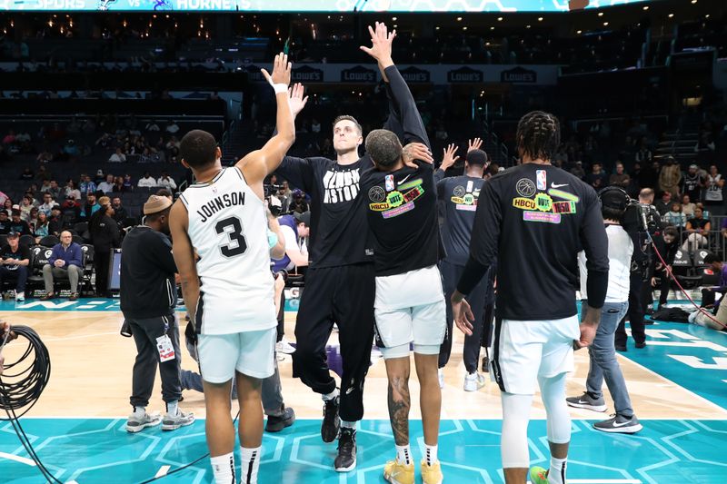 CHARLOTTE, NC - FEBRUARY 15: Zach Collins #23 of the San Antonio Spurs walks on to the court prior to the game against the Charlotte Hornets on February 15, 2023 at Spectrum Center in Charlotte, North Carolina. NOTE TO USER: User expressly acknowledges and agrees that, by downloading and or using this photograph, User is consenting to the terms and conditions of the Getty Images License Agreement.  Mandatory Copyright Notice:  Copyright 2023 NBAE (Photo by Brock Williams-Smith/NBAE via Getty Images)