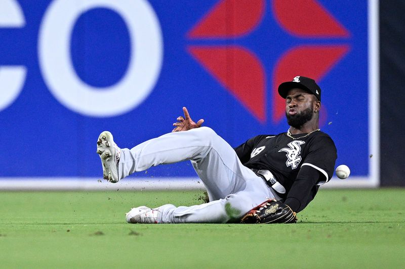 Sep 21, 2024; San Diego, California, USA; Chicago White Sox center fielder Luis Robert Jr. (88) cannot catch a double hit by San Diego Padres left fielder Jurickson Profar (not pictured) during the fifth inning at Petco Park. Mandatory Credit: Orlando Ramirez-Imagn Images