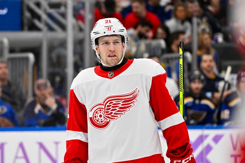 Dec 12, 2023; St. Louis, Missouri, USA;  Detroit Red Wings center Austin Czarnik (21) in action against the St. Louis Blues during the third period at Enterprise Center. Mandatory Credit: Jeff Curry-USA TODAY Sports