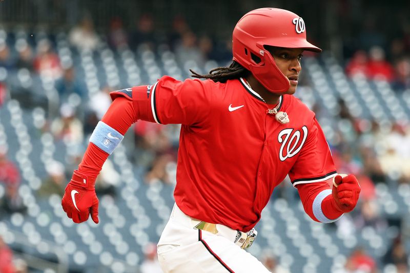 Apr 6, 2025; Washington, District of Columbia, USA; Washington Nationals shortstop CJ Abrams (5) runs to first base during the sixth inning against the Arizona Diamondbacks at Nationals Park. Mandatory Credit: Daniel Kucin Jr.-Imagn Images