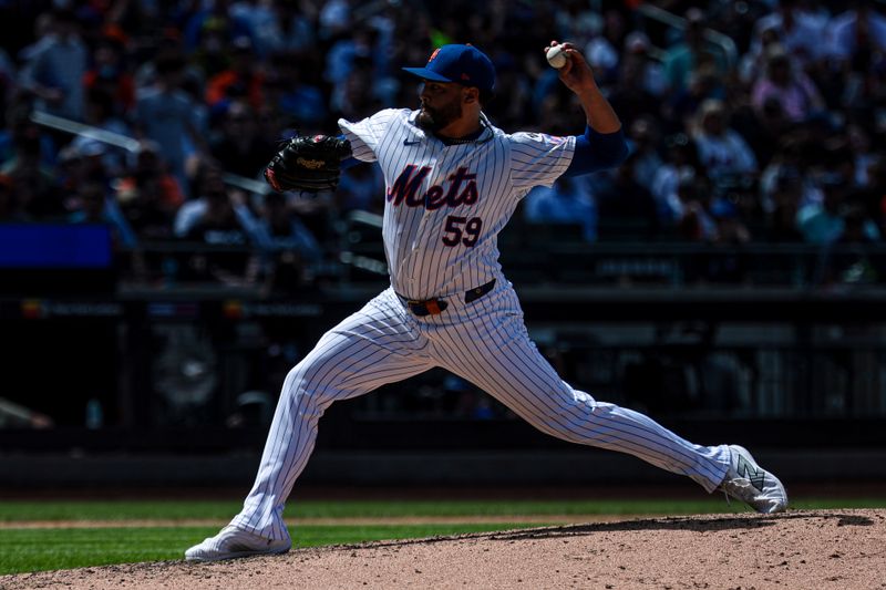Aug 21, 2024; New York City, New York, USA; New York Mets starting pitcher Sean Manaea (59) delivers a pitch during the sixth inning against the Baltimore Orioles at Citi Field. Mandatory Credit: Vincent Carchietta-USA TODAY Sports