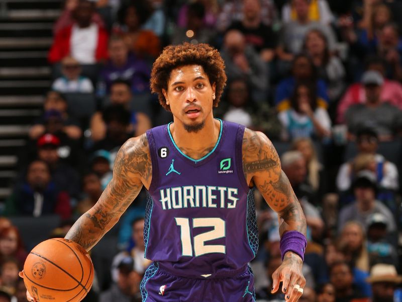 CHARLOTTE, NC -OCTOBER 29: Kelly Oubre Jr. #12 of the Charlotte Hornets handles the ball during the game against the Golden State Warriors on October 29, 2022 at Spectrum Center in Charlotte, North Carolina. NOTE TO USER: User expressly acknowledges and agrees that, by downloading and or using this photograph, User is consenting to the terms and conditions of the Getty Images License Agreement. Mandatory Copyright Notice: Copyright 2022 NBAE (Photo by Kent Smith/NBAE via Getty Images)