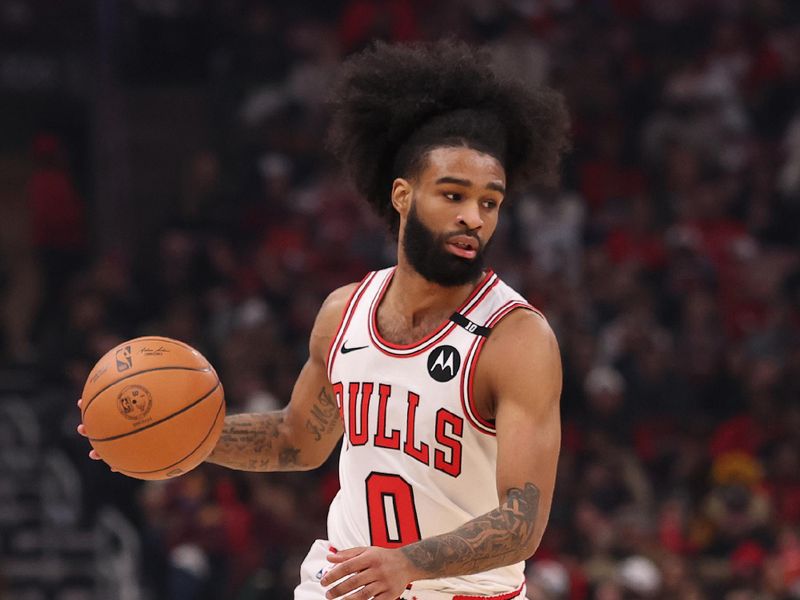 CHICAGO, ILLINOIS - JANUARY 10: Coby White #0 of the Chicago Bulls dribbles against the Washington Wizards during the second half at the United Center on January 10, 2025 in Chicago, Illinois. NOTE TO USER: User expressly acknowledges and agrees that, by downloading and or using this photograph, User is consenting to the terms and conditions of the Getty Images License Agreement.  (Photo by Michael Reaves/Getty Images)