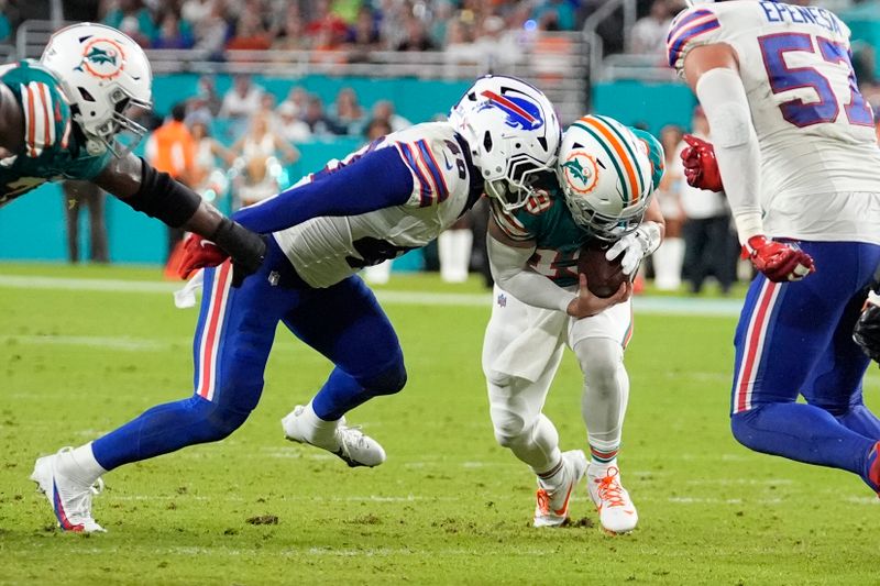 Buffalo Bills linebacker Von Miller (40) sacks Miami Dolphins quarterback Skylar Thompson (19) during the second half of an NFL football game, Thursday, Sept. 12, 2024, in Miami Gardens, Fla. (AP Photo/Rebecca Blackwell)