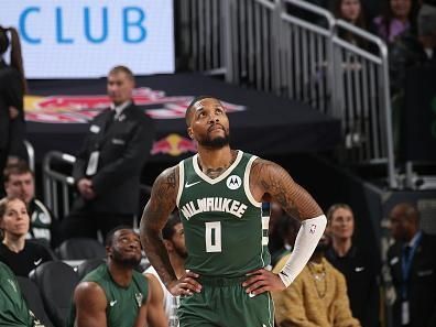 MILWAUKEE, WI - DECEMBER 11:  Damian Lillard #0 of the Milwaukee Bucks looks on during the game on December 11, 2023 at the Fiserv Forum Center in Milwaukee, Wisconsin. NOTE TO USER: User expressly acknowledges and agrees that, by downloading and or using this Photograph, user is consenting to the terms and conditions of the Getty Images License Agreement. Mandatory Copyright Notice: Copyright 2023 NBAE (Photo by Gary Dineen/NBAE via Getty Images).