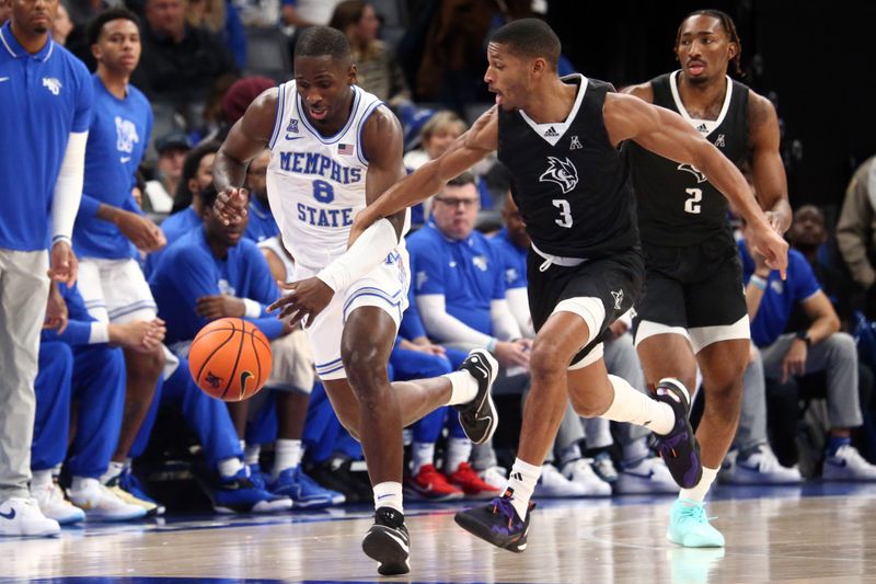 Jan 31, 2024; Memphis, Tennessee, USA; Memphis Tigers forward David Jones (8) drives the ball up the court as Rice Owls guard Travis Evee (3) attempts to steal the ball during the first half at FedExForum. Mandatory Credit: Petre Thomas-USA TODAY Sports