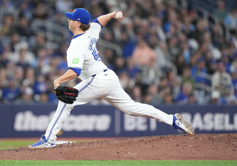 Apr 17, 2024; Toronto, Ontario, CAN; Toronto Blue Jays relief pitcher Erik Swanson (50) throws a pitch against the New York Yankees during the ninth inning at Rogers Centre. Mandatory Credit: Nick Turchiaro-USA TODAY Sports