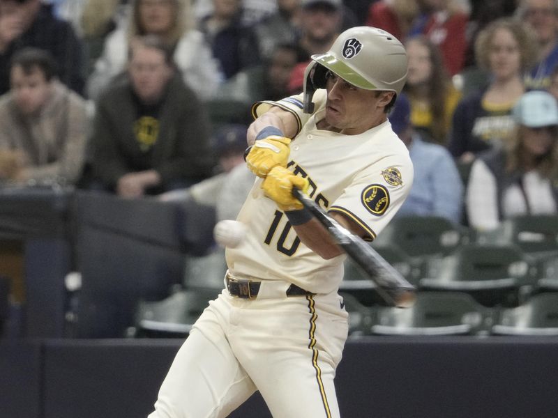 May 18, 2025; Milwaukee, Wisconsin, USA; Milwaukee Brewers outfielder Sal Frelick (10) gets a base hit against the Minnesota Twins in the third inning at American Family Field. Mandatory Credit: Michael McLoone-Imagn Images