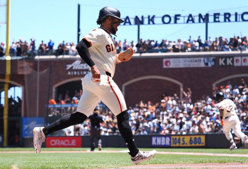 Jun 30, 2024; San Francisco, California, USA; San Francisco Giants left fielder Luis Matos (29) scores a run on a double by first baseman David Villar (32) during the third inning aalad at Oracle Park. Mandatory Credit: Kelley L Cox-USA TODAY Sports