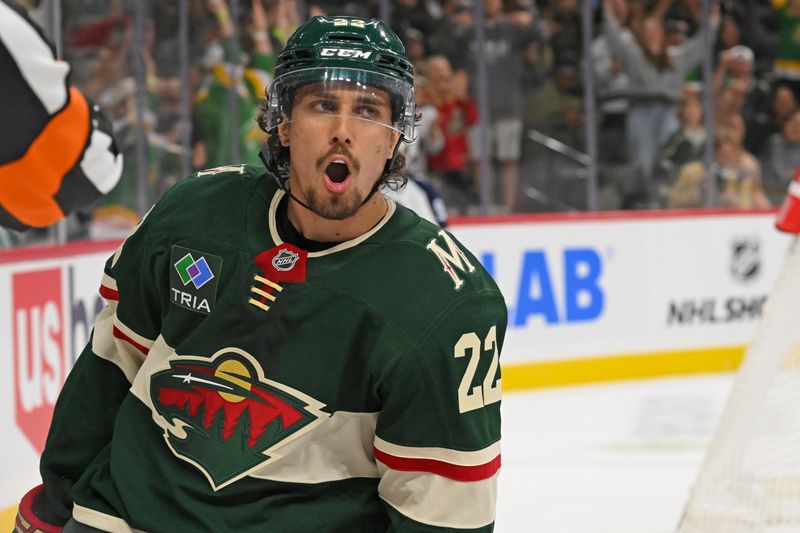 Sep 27, 2024; Saint Paul, Minnesota, USA;  Minnesota Wild forward Marat Khusnutdinov (22) celebrates his short-handed goal against the Winnipeg Jets during the second period at Xcel Energy Center. Mandatory Credit: Nick Wosika-Imagn Images

