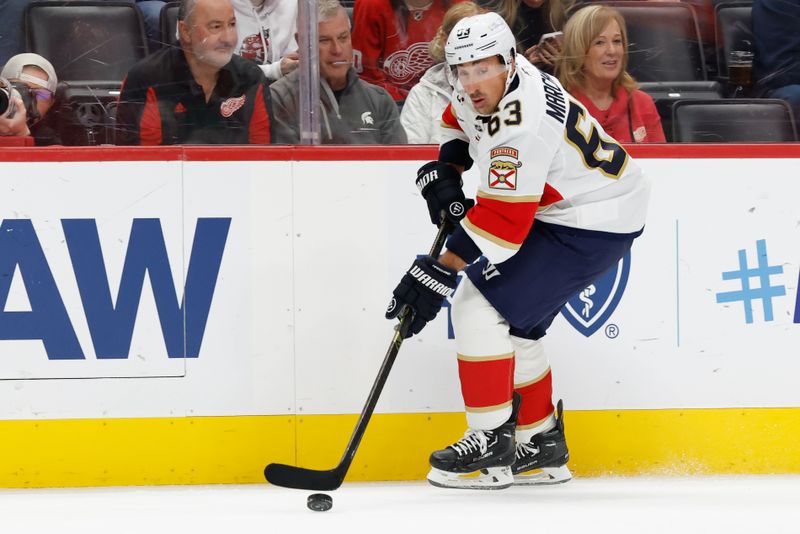 Oct 15, 2025; Detroit, Michigan, USA;  Florida Panthers left wing Brad Marchand (63) skates with the puck in the first period against the Detroit Red Wings at Little Caesars Arena. Mandatory Credit: Rick Osentoski-Imagn Images