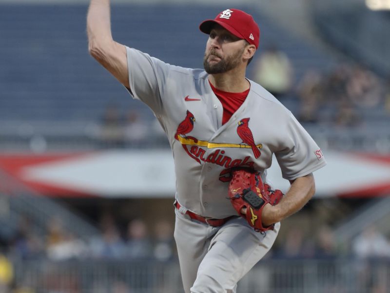 Aug 22, 2023; Pittsburgh, Pennsylvania, USA; St. Louis Cardinals starting pitcher Adam Wainwright (50) pitches against the Pittsburgh Pirates during the third inning at PNC Park. Mandatory Credit: Charles LeClaire-USA TODAY Sports