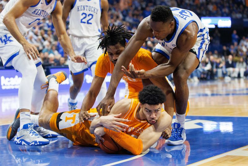 Feb 18, 2023; Lexington, Kentucky, USA; Tennessee Volunteers forward Olivier Nkamhoua (13) goes to the floor with the ball during the first half against the Kentucky Wildcats at Rupp Arena at Central Bank Center. Mandatory Credit: Jordan Prather-USA TODAY Sports