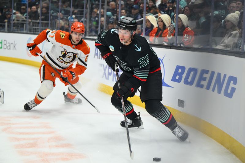 Jan 23, 2026; Seattle, Washington, USA; Seattle Kraken defenseman Vince Dunn (29) plays the puck during the first period against the Anaheim Ducks at Climate Pledge Arena. Mandatory Credit: Steven Bisig-Imagn Images