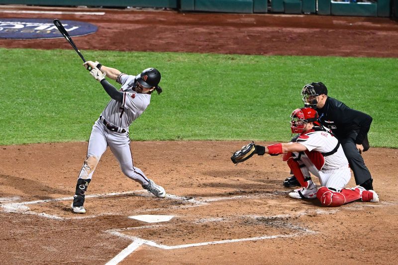 Oct 24, 2023; Philadelphia, Pennsylvania, USA; Arizona Diamondbacks left fielder Corbin Carroll (7) hits a single against the Philadelphia Phillies in the third inning during game seven of the NLCS for the 2023 MLB playoffs at Citizens Bank Park. Mandatory Credit: Kyle Ross-USA TODAY Sports