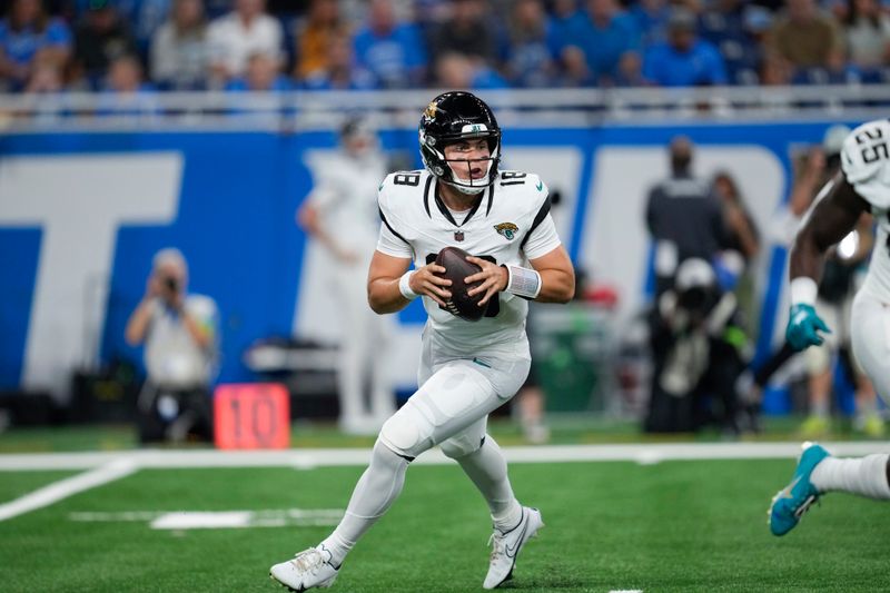 Jacksonville Jaguars quarterback Nathan Rourke (18) looks to throw against the Detroit Lions during an preseason NFL football game in Detroit, Saturday, Aug. 19, 2023. (AP Photo/Paul Sancya)