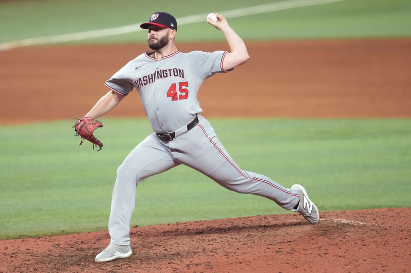 Sep 11, 2025; Miami, Florida, USA;  Washington Nationals relief pitcher Konnor Pilkington (45) throws in the eighth inning against the Miami Marlins at loanDepot Park. Mandatory Credit: Jim Rassol-Imagn Images