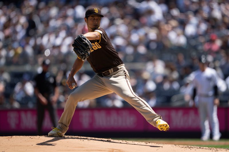 May 28, 2023; Bronx, New York, USA; San Diego Padres pitcher Yu Darvish (11) delivers a pitch against the New York Yankees during the first inning at Yankee Stadium. Mandatory Credit: Gregory Fisher-USA TODAY Sports