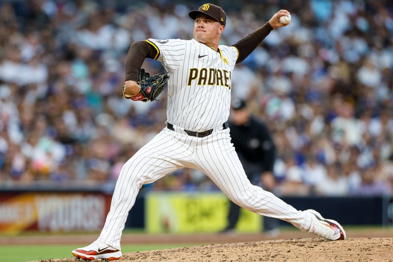 Jul 31, 2024; San Diego, California, USA; San Diego Padres relief pitcher Adrian Morejon (50) pitches during the sixth inning against the Los Angeles Dodgers at Petco Park. Mandatory Credit: David Frerker-USA TODAY Sports