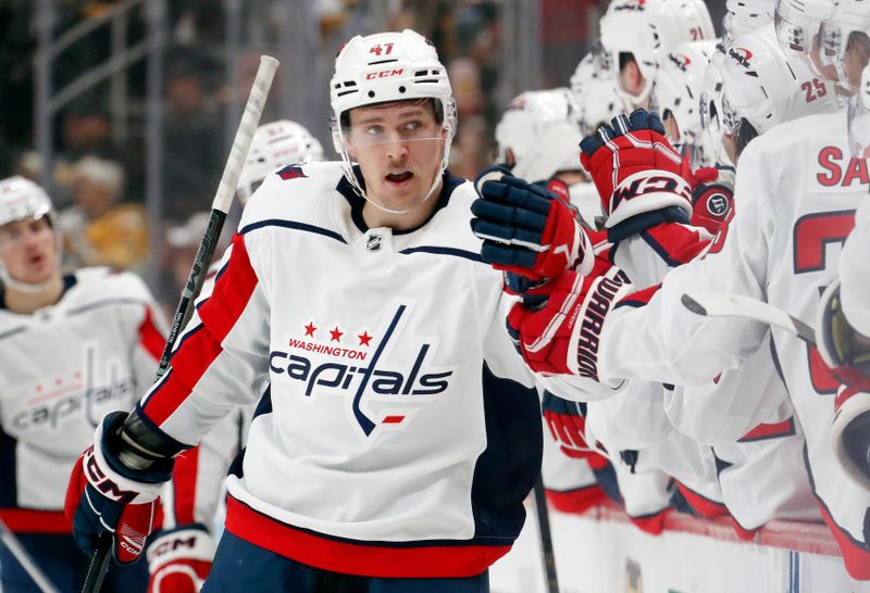 Jan 2, 2024; Pittsburgh, Pennsylvania, USA;  Washington Capitals left wing Beck Malenstyn (47) celebrates with the Capitals bench after scoring a goal against the Pittsburgh Penguins during the first period at PPG Paints Arena. Mandatory Credit: Charles LeClaire-USA TODAY Sports