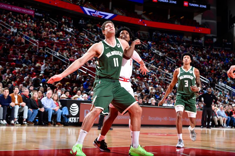 HOUSTON, TX - JANUARY 6: Brook Lopez #11 of the Milwaukee Bucks waits for a rebound during the game against the Houston Rockets on January 6, 2024 at the Toyota Center in Houston, Texas. NOTE TO USER: User expressly acknowledges and agrees that, by downloading and or using this photograph, User is consenting to the terms and conditions of the Getty Images License Agreement. Mandatory Copyright Notice: Copyright 2024 NBAE (Photo by Logan Riely/NBAE via Getty Images)