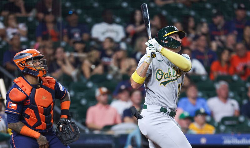 Sep 11, 2023; Houston, Texas, USA; Oakland Athletics first baseman Ryan Noda (49) hits a home run during the ninth inning against the Houston Astros at Minute Maid Park. Mandatory Credit: Troy Taormina-USA TODAY Sports