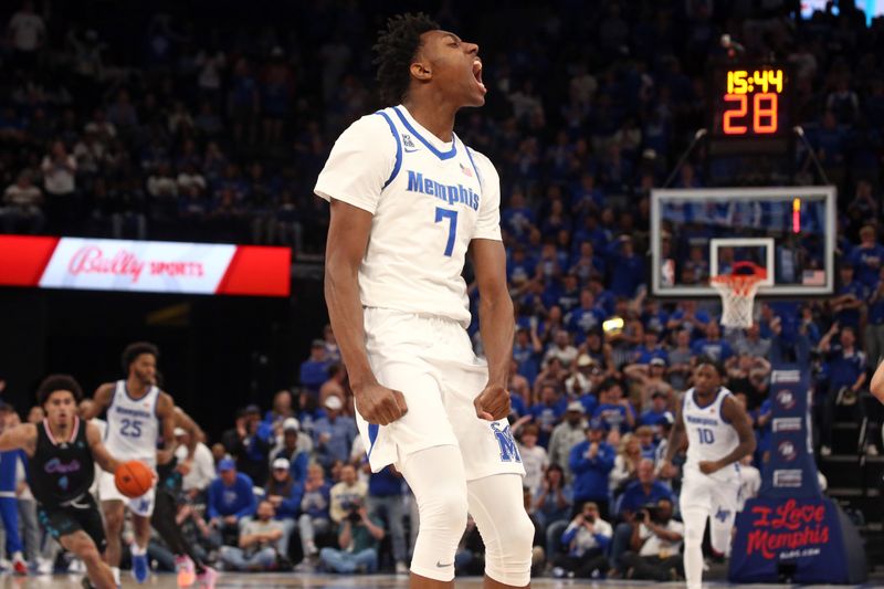 Feb 25, 2024; Memphis, Tennessee, USA; Memphis Tigers forward Nae'Qwan Tomlin (7) reacts after a dunk during the second half against the Florida Atlantic Owls at FedExForum. Mandatory Credit: Petre Thomas-USA TODAY Sports