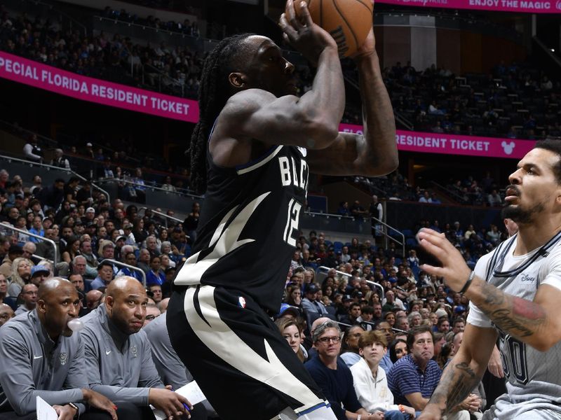 ORLANDO, FL - JANUARY 10: Taurean Prince #12 of the Milwaukee Bucks shoots a three point basket during the game against the Orlando Magic on January 10, 2025 at Kia Center in Orlando, Florida. NOTE TO USER: User expressly acknowledges and agrees that, by downloading and or using this photograph, User is consenting to the terms and conditions of the Getty Images License Agreement. Mandatory Copyright Notice: Copyright 2025 NBAE (Photo by Gary Bassing/NBAE via Getty Images)