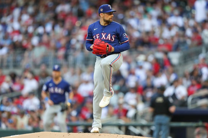 Apr 20, 2024; Cumberland, Georgia, USA; Texas Rangers starting pitcher Nathan Eovaldi (17) pitches against the Atlanta Braves in the first inning at Truist Park. Mandatory Credit: Mady Mertens-USA TODAY Sports
