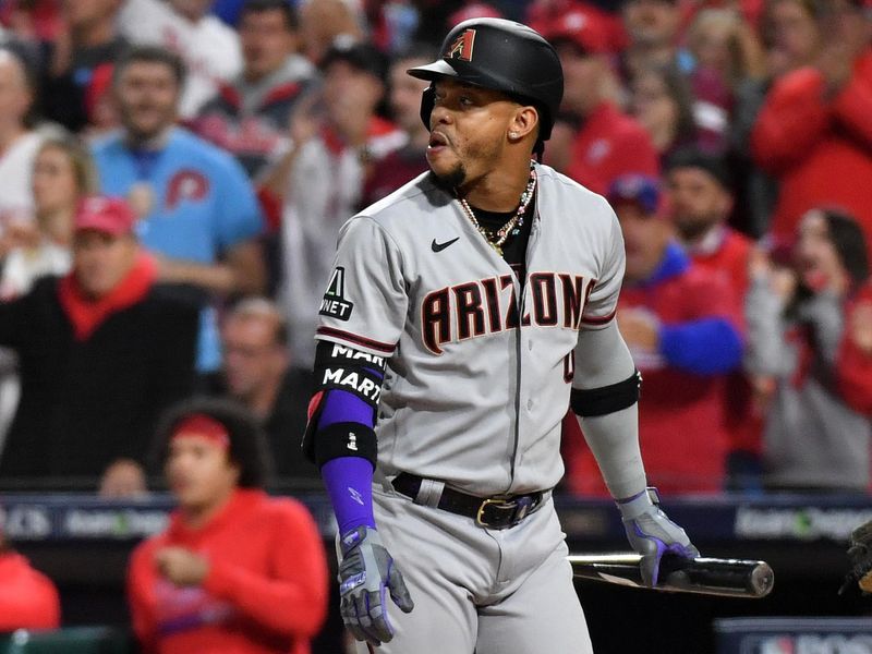 Oct 17, 2023; Philadelphia, Pennsylvania, USA; Arizona Diamondbacks second baseman Ketel Marte (4) reacts after striking out against the Philadelphia Phillies during the first inning for game two of the NLCS for the 2023 MLB playoffs at Citizens Bank Park. Mandatory Credit: Eric Hartline-USA TODAY Sports